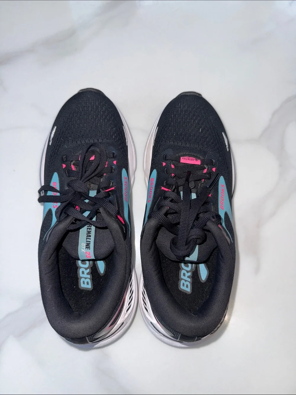 Brooks Women’s Black Running Shoes with Pink & Teal Accents